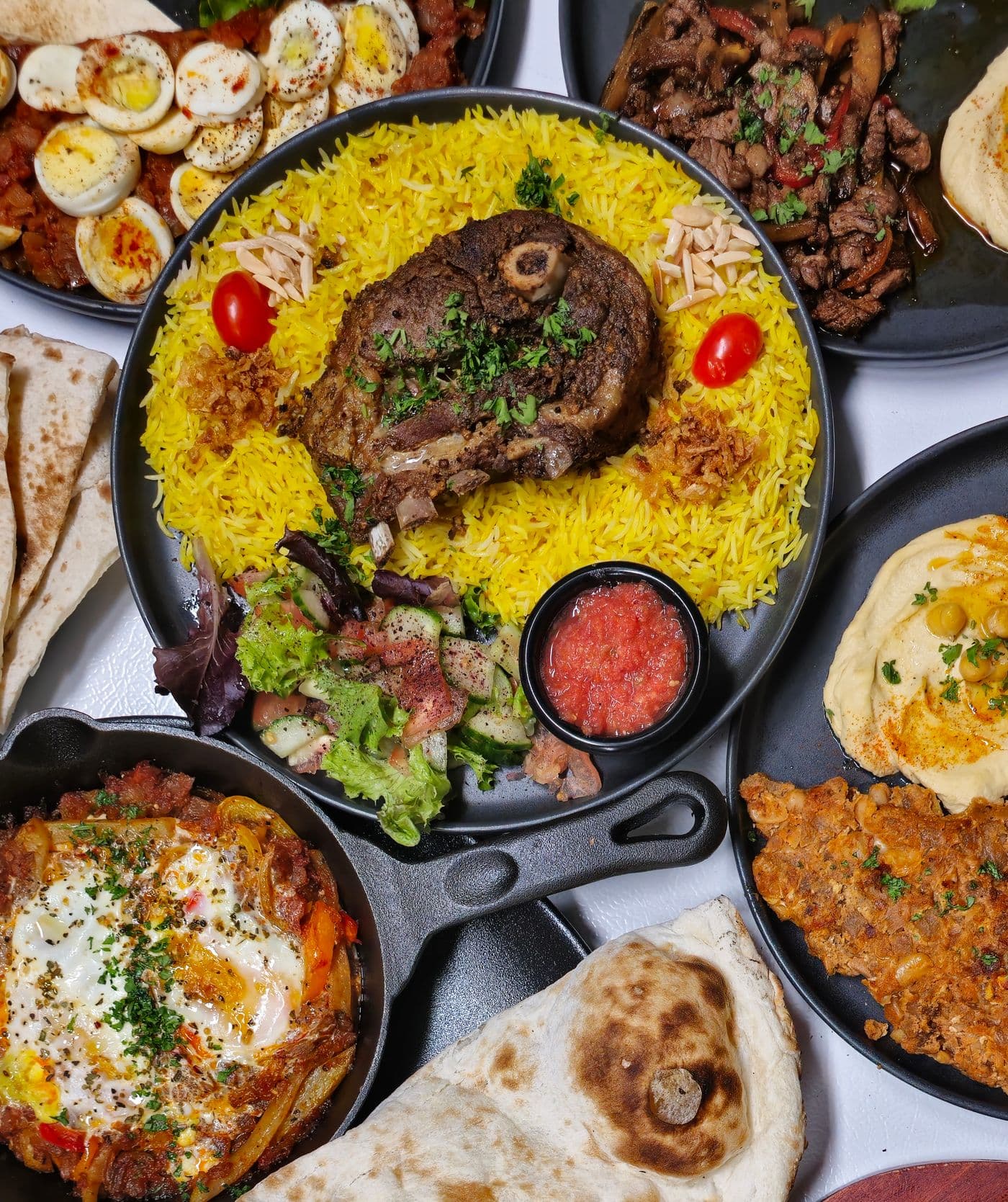 Lamb over yellow rice with sides, halal-cart style
